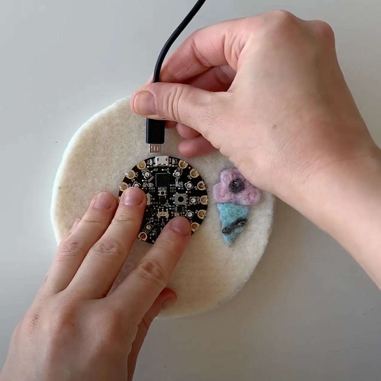 How to Felt Capacitive Sensors with E-Textiles