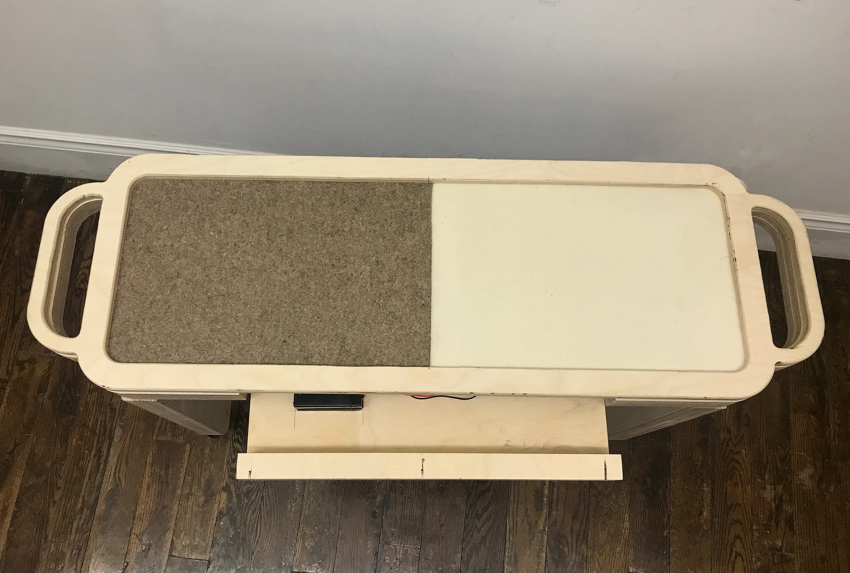 Detail shot of the built in shelf, open
